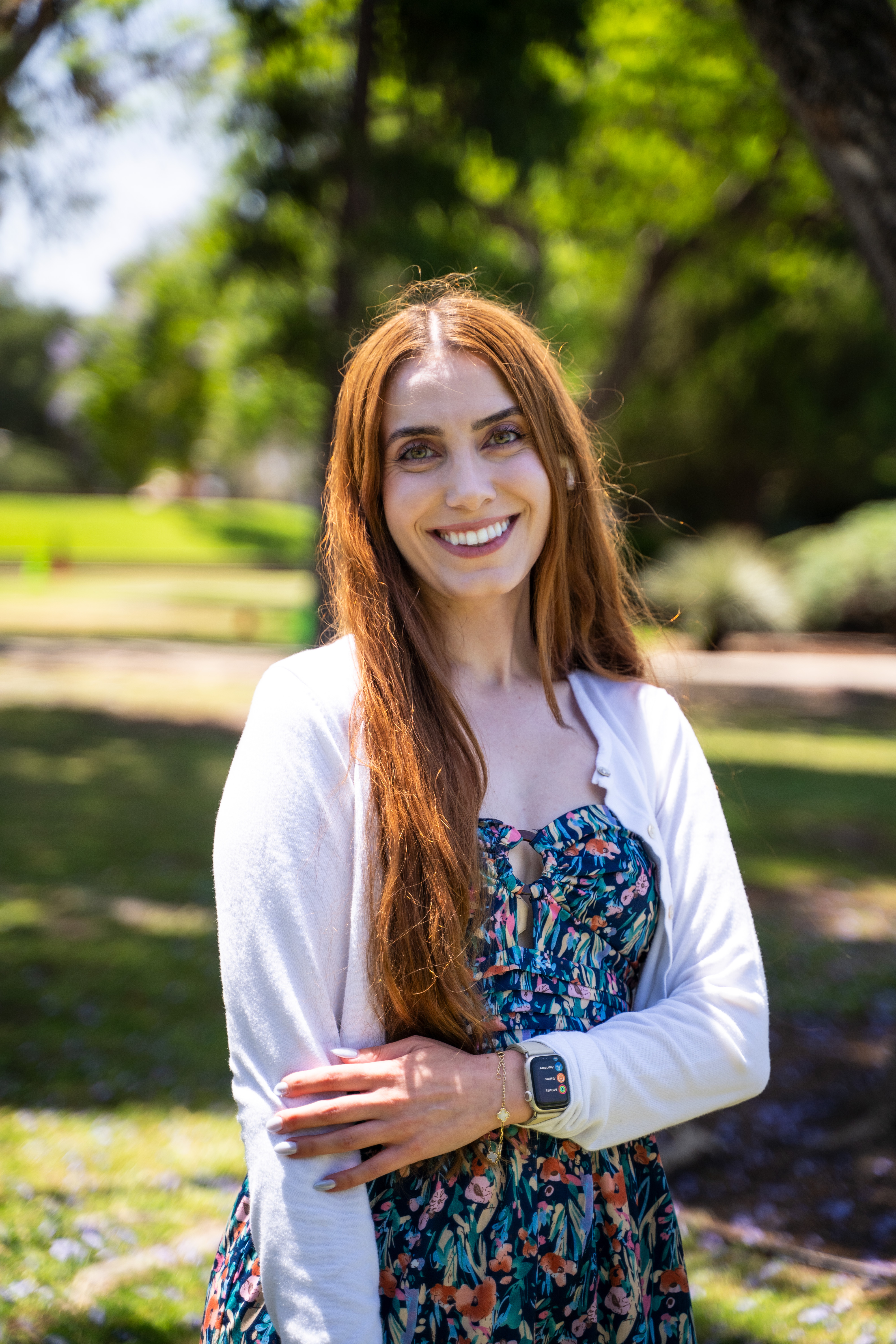 Smiling portrait in warm park light